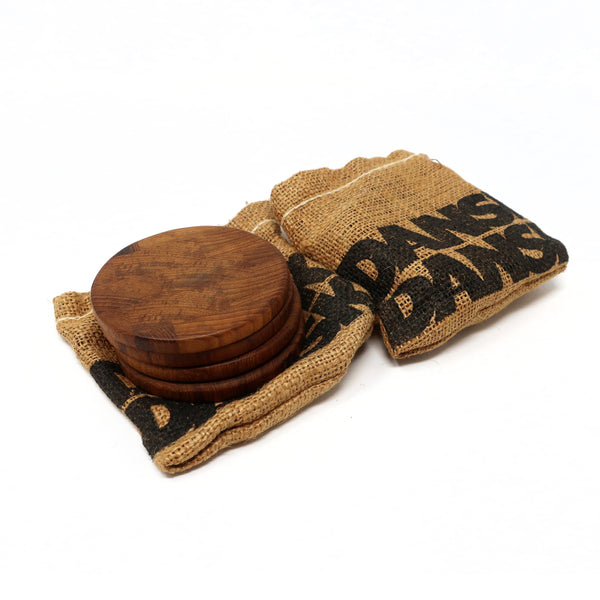 Set of Eight Danish Modern Teak Coasters by Jens H. Quistgaard for Dansk