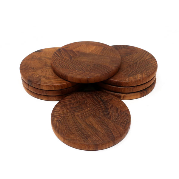 Set of Eight Danish Modern Teak Coasters by Jens H. Quistgaard for Dansk