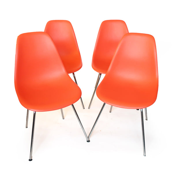 Set of Four Herman Miller Eames Plastic Dining Chairs